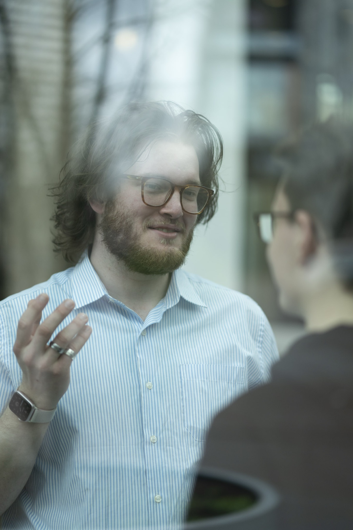 A Cyberfusion engineer talking with a colleague